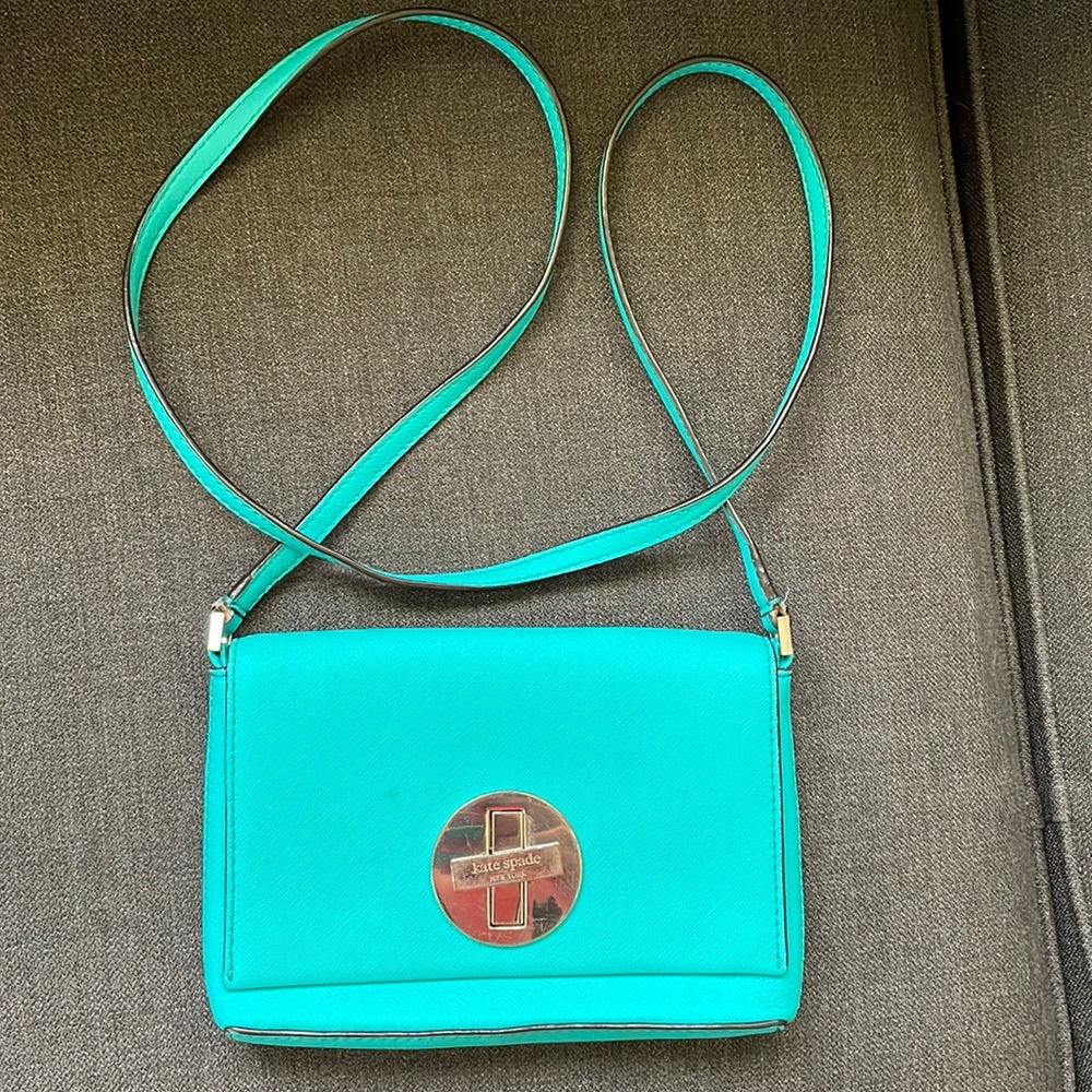 Turquoise Kate Spade Cross Body w/ metal turn clasp.